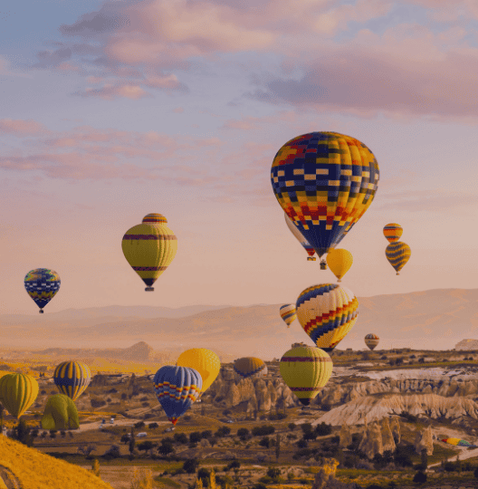 turkey ballon in the sky near mountains